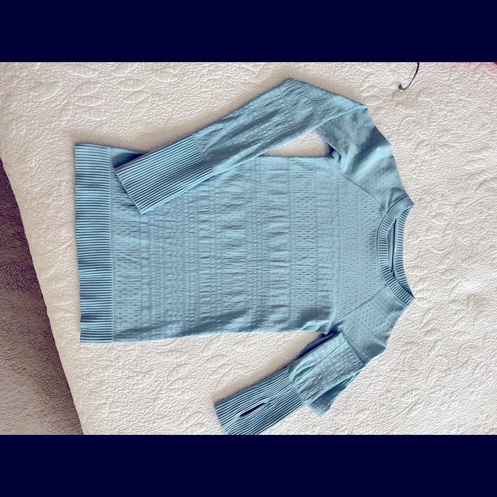 Lululemon Restless Pullover size 2, inside tag cut off. Very minimal wear!